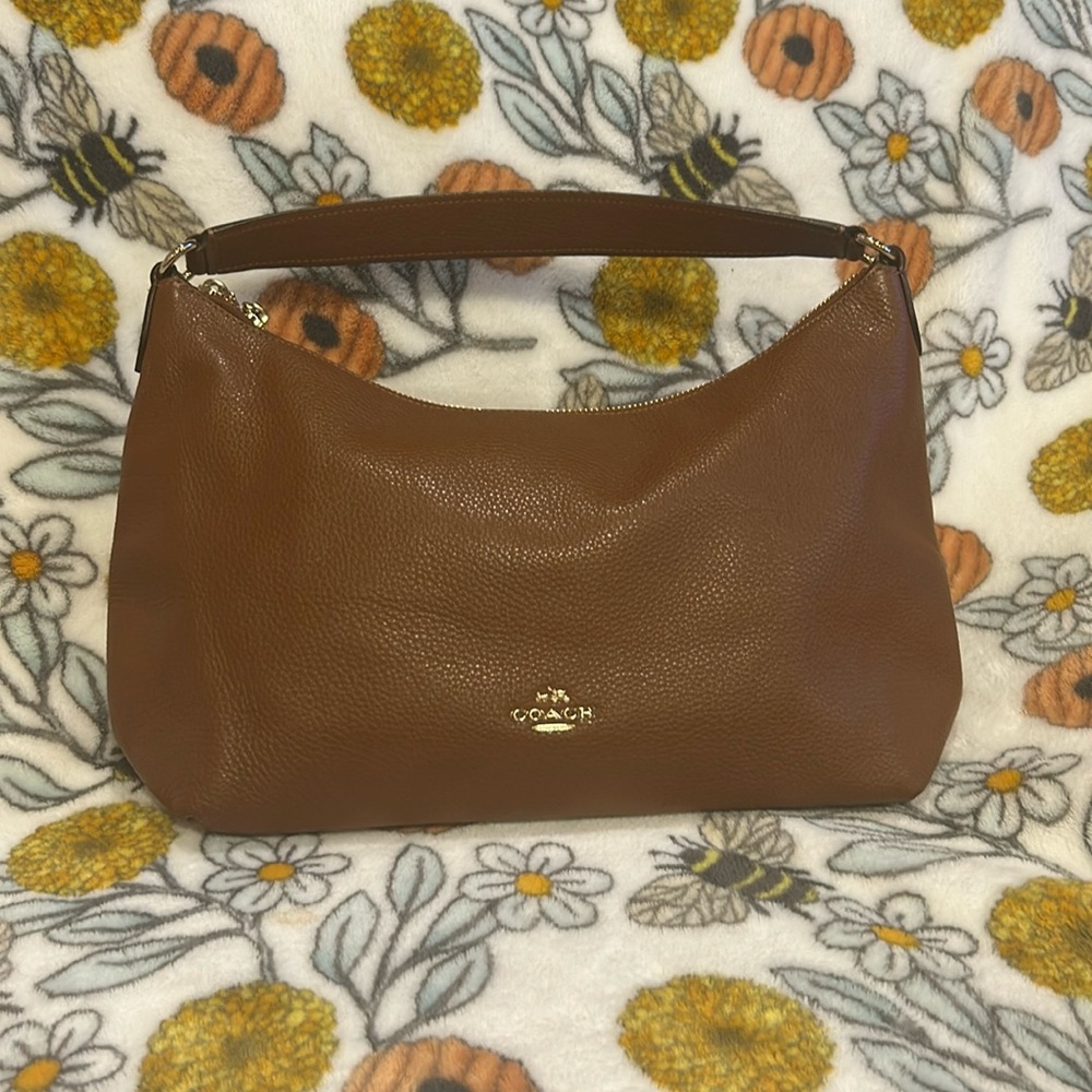 Coach New York East/West Celeste
Convertible In Pebble Saddle Leather Hobo
Bag